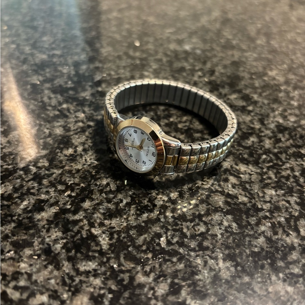 Classic Silver and Gold Watch with Vintage Design
